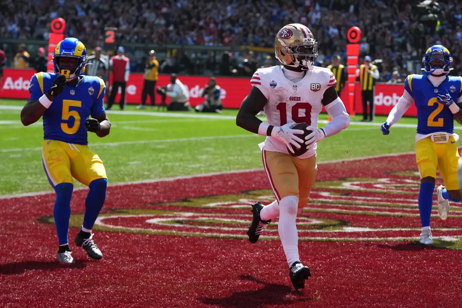 San Francisco 49ers wide receiver Deebo Samuel scores a touchdown in the third quarter against the Rams.